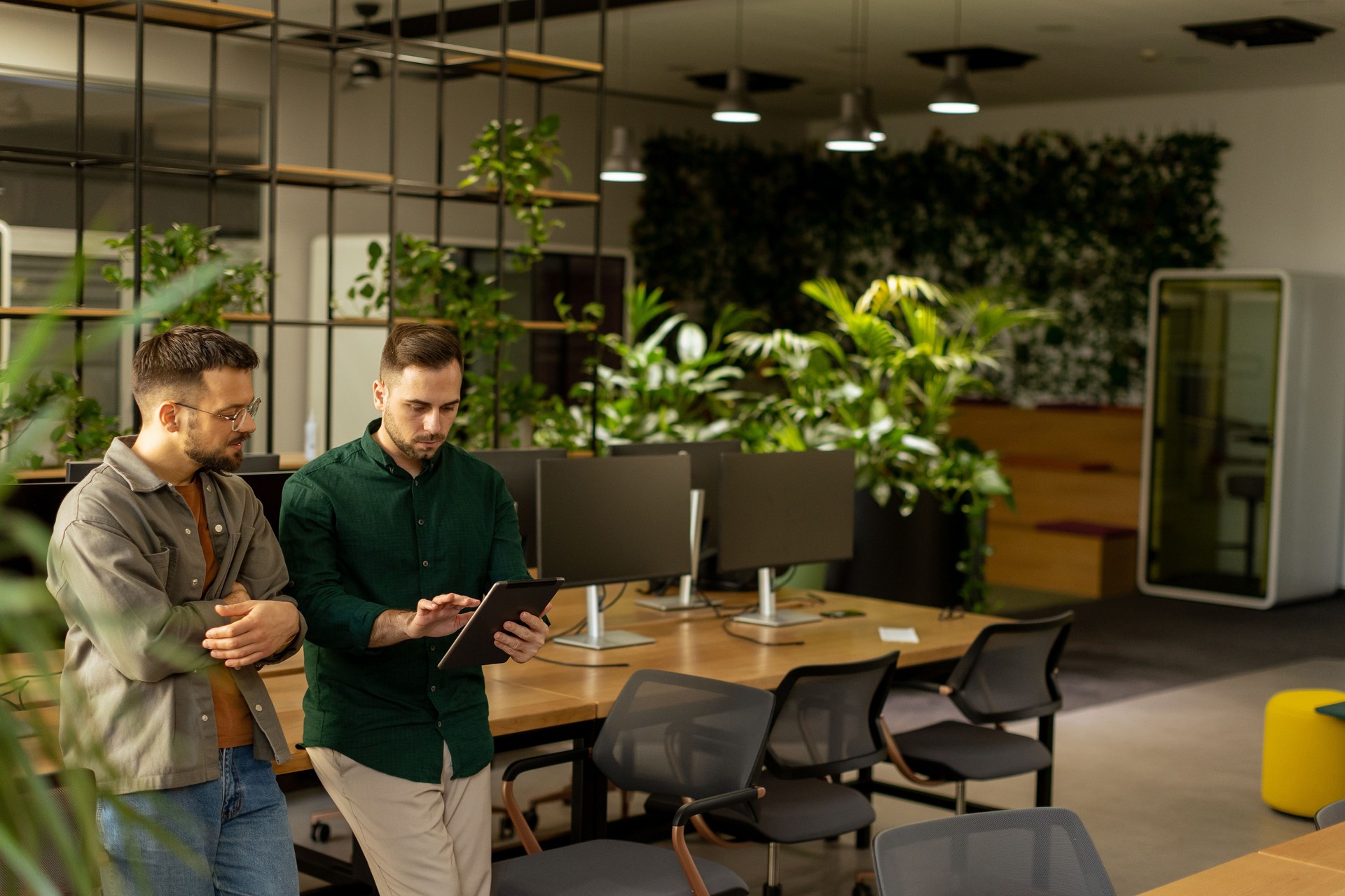 Collaborative Discussion in a Modern Office With Exposed Brick Walls